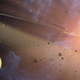 Impresión mostrando dos cinturones de asteroides y un planeta orbitando Epsilon Eridani. Wikimedia Commons
